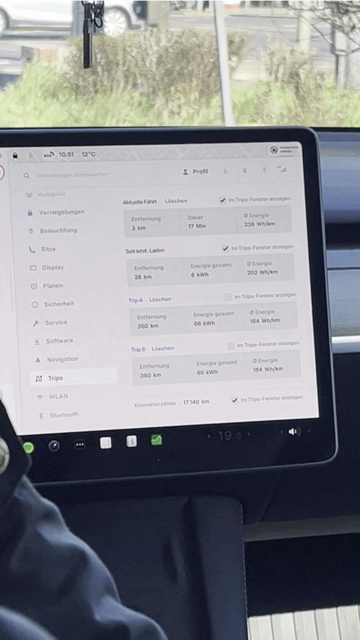 A car's centre screen and dashboard during an in-car test drive.